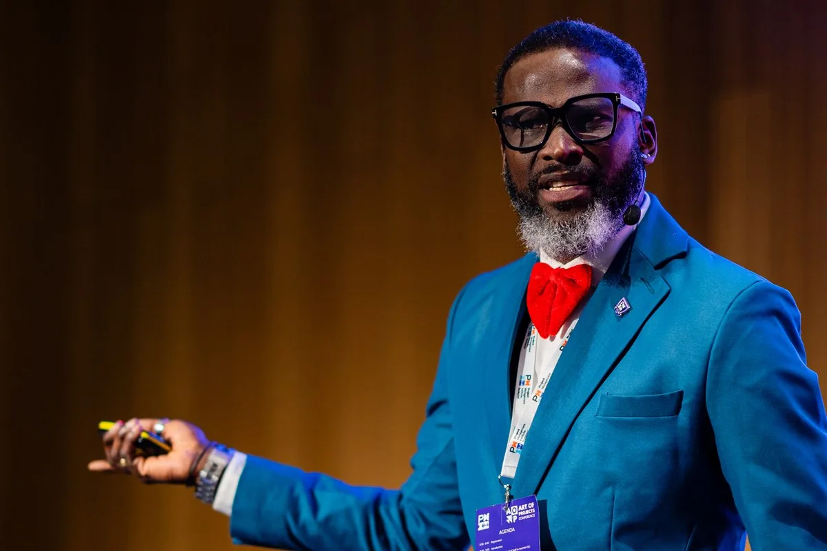 Dr. Charles Igwe speaking on stage